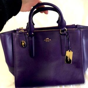 Like new Coach purple purse! No flaws or damage! Used once!